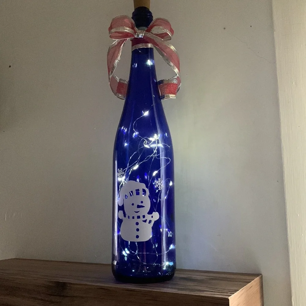 Snowman blue wine bottle lantern